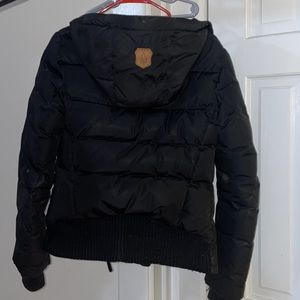 Mackage coat size xs , working zipper , the fur is damaged but it is detachable